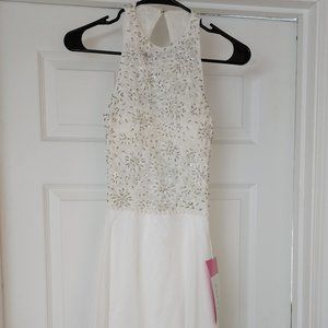 White long backless halter dress with sequins